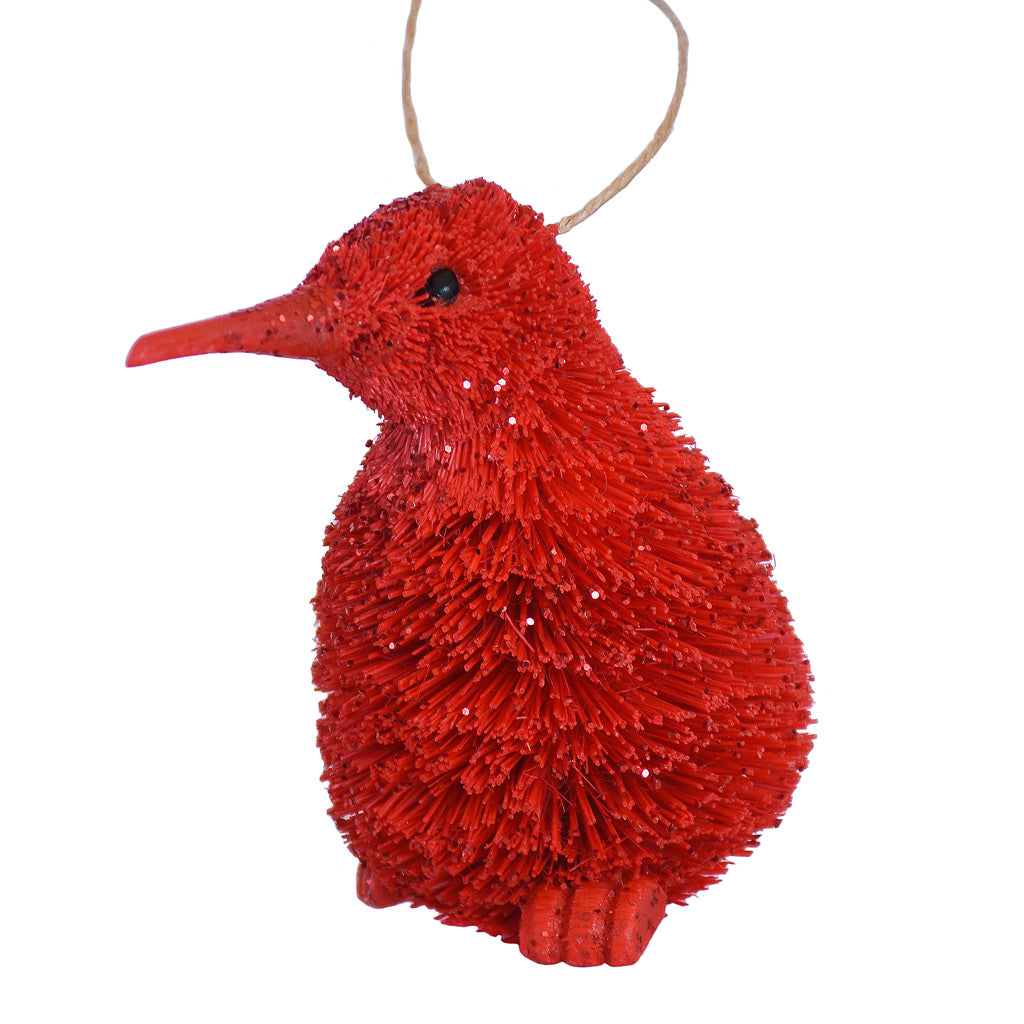 Decorative Bristle Kiwi bird ornament with glittery red finish on a white background