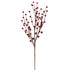 Artificial red berry branch on a white background
