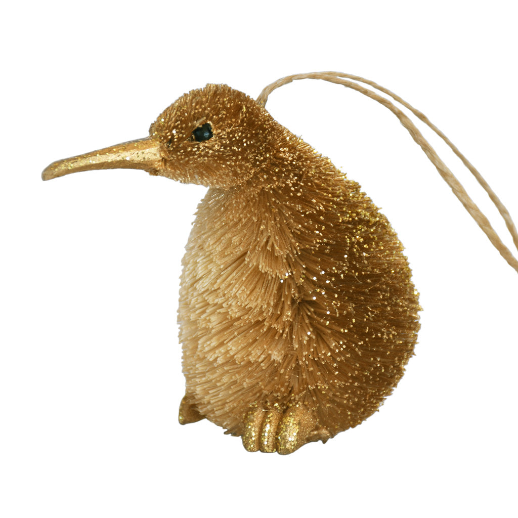 Decorative Bristle Kiwi bird ornament with glittery gold finish on a white background