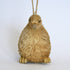 Decorative Bristle Kiwi bird ornament with glittery gold finish on a white background