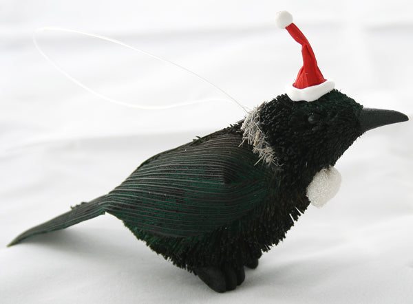 Tui - Natural with Christmas hat